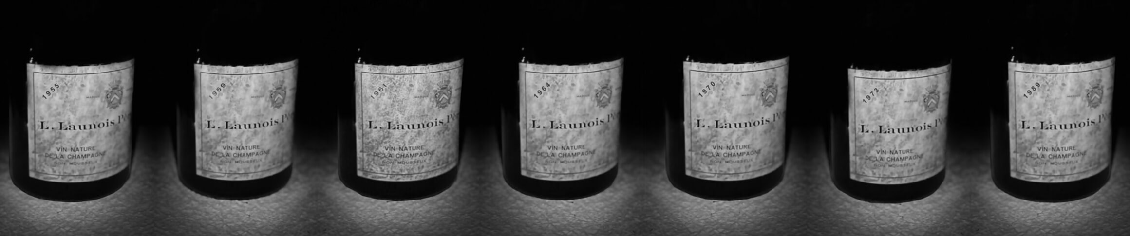 a-propos-4 bouteilles de champagne
